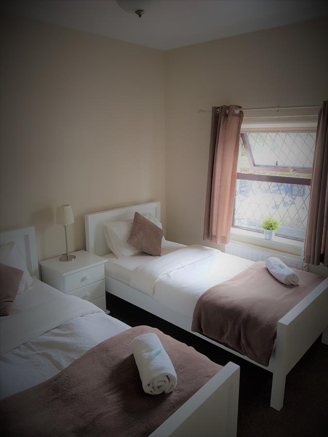 Bed and Breakfast The Coach House Roundwood Pokoj fotografie